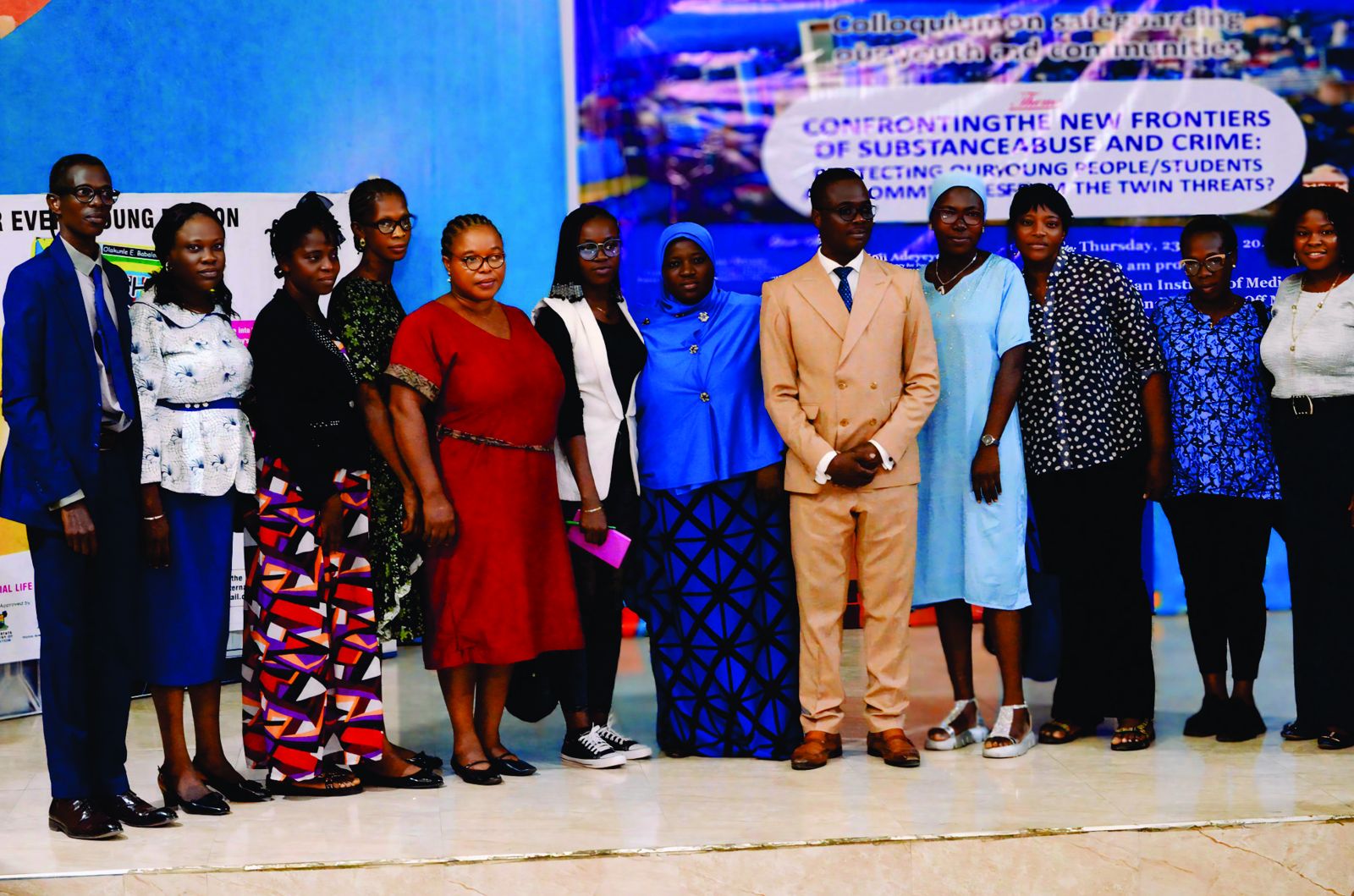 Participants and organisers on stage