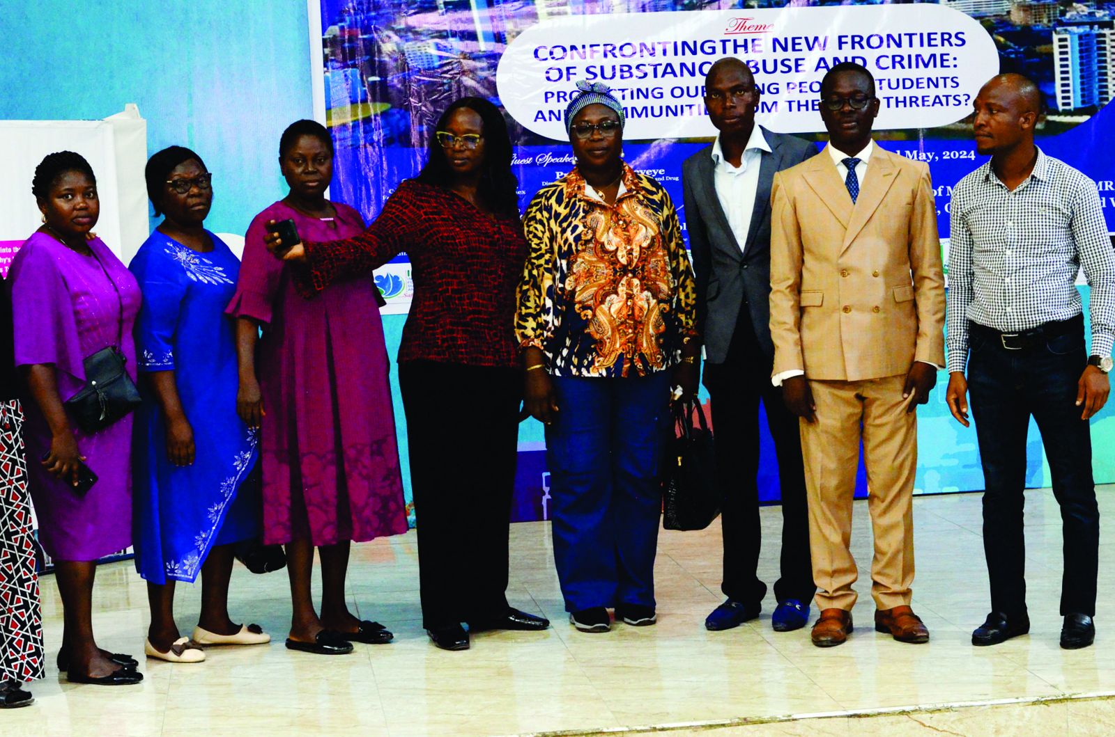 Participants and organisers on stage