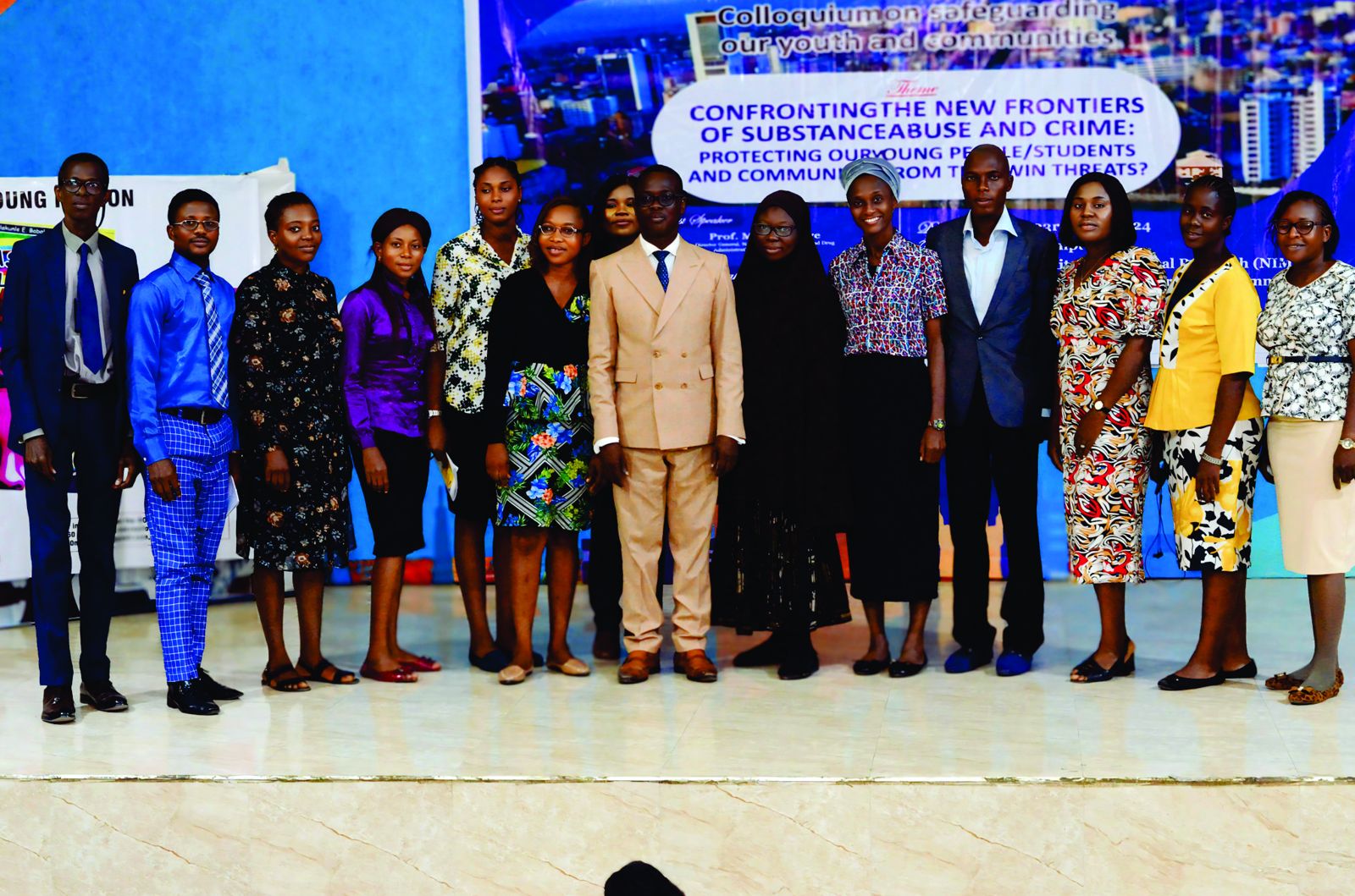 Participants and organisers on stage