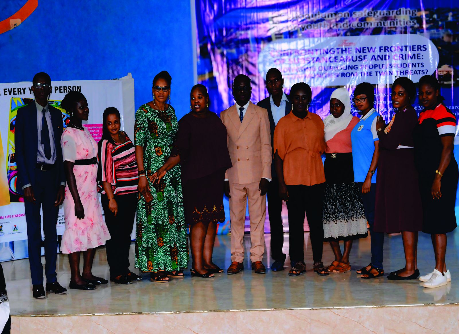 Participants and organisers on stage