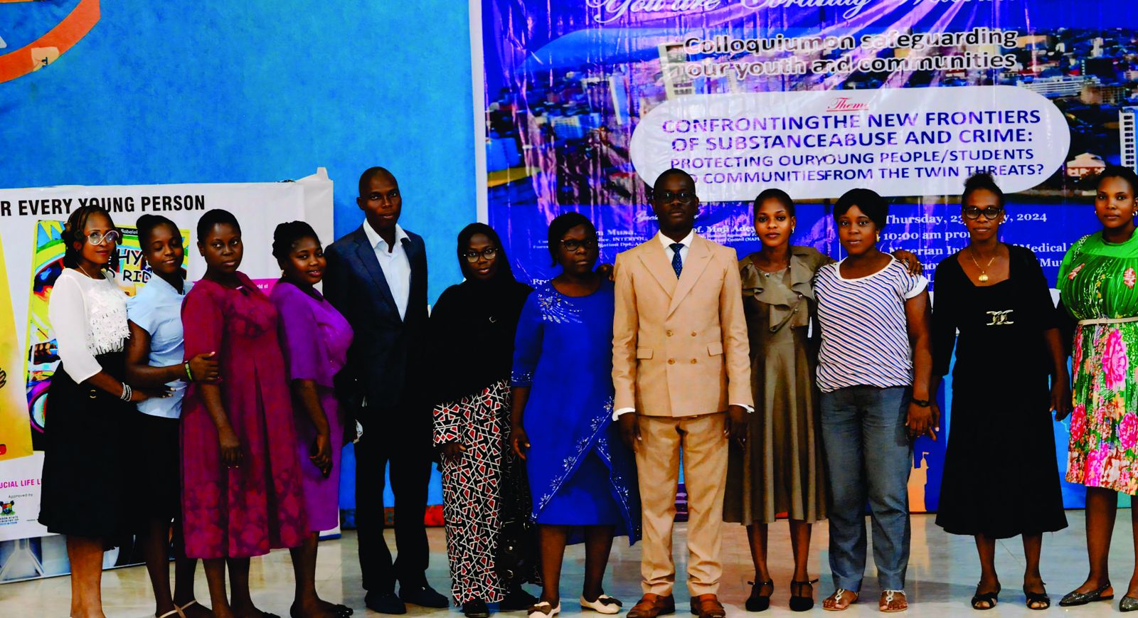 Participants and organisers on stage