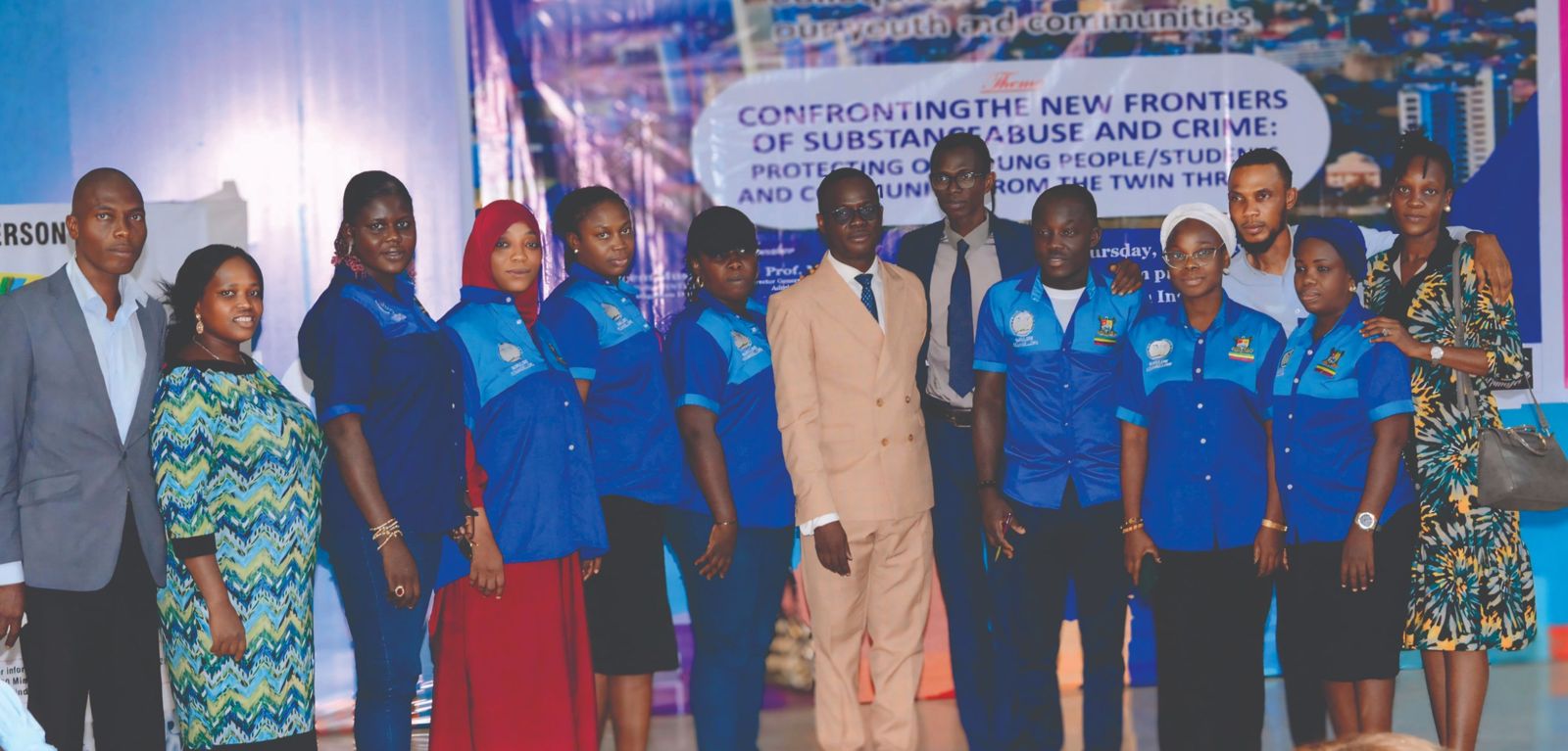 Participants in uniform with the organisers