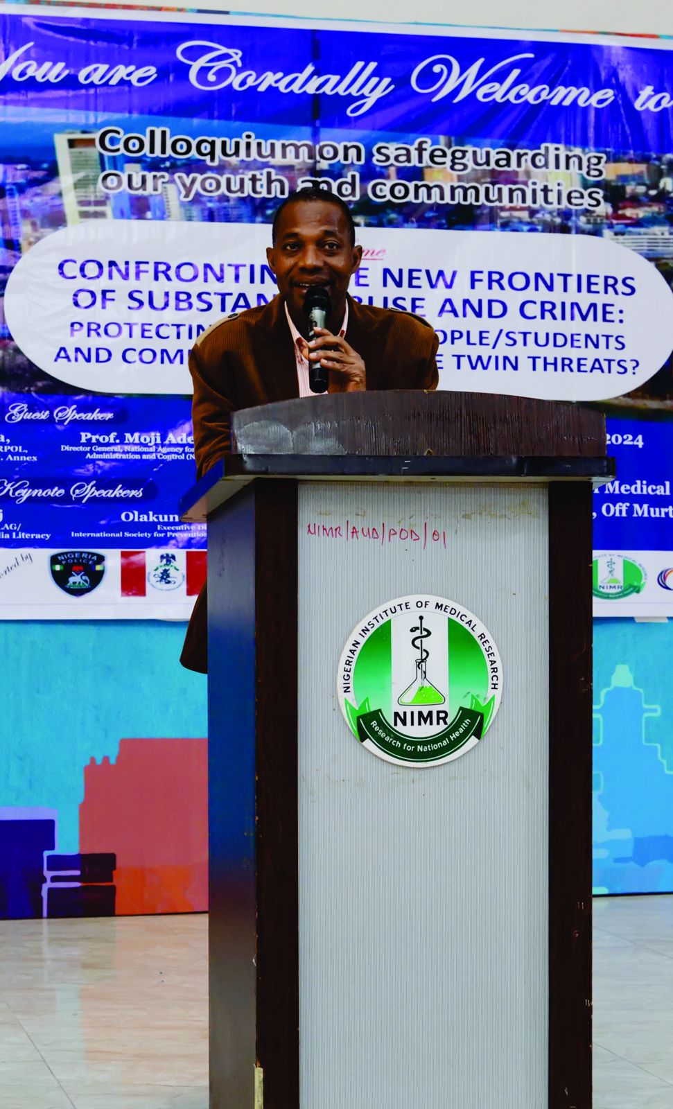 A guest speaker at the NIMR lectern