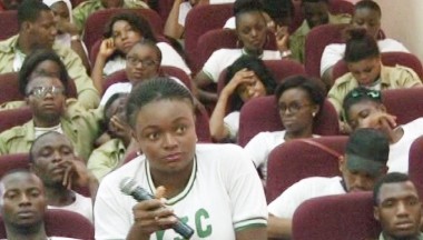 A participant speaks from the floor